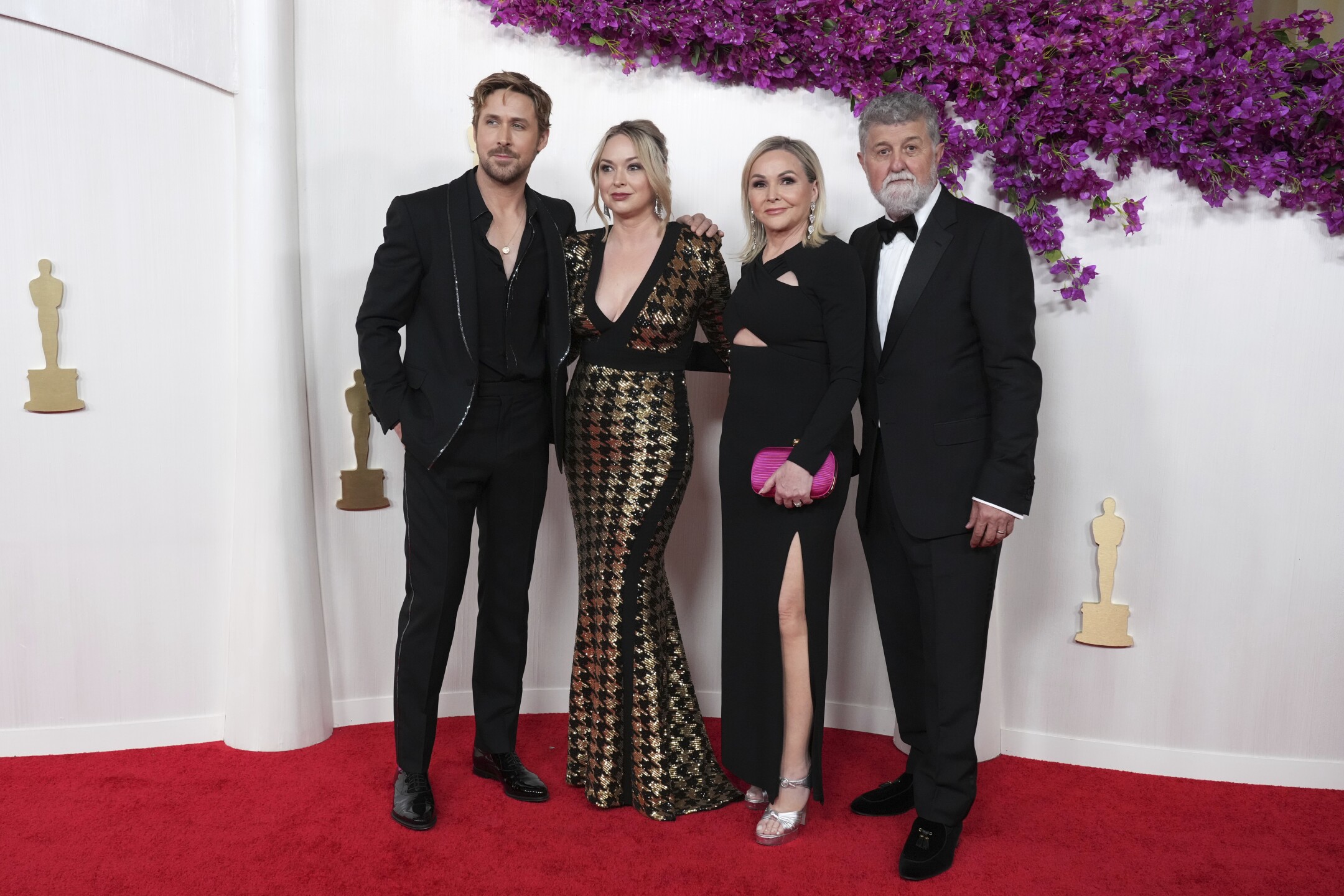 Ryan Gosling, from left, Mandi Gosling, Donna Gosling, and Thomas Gosling arrive at the Oscars on Sunday, March 10, 2024, at the Dolby Theatre in Los Angeles.