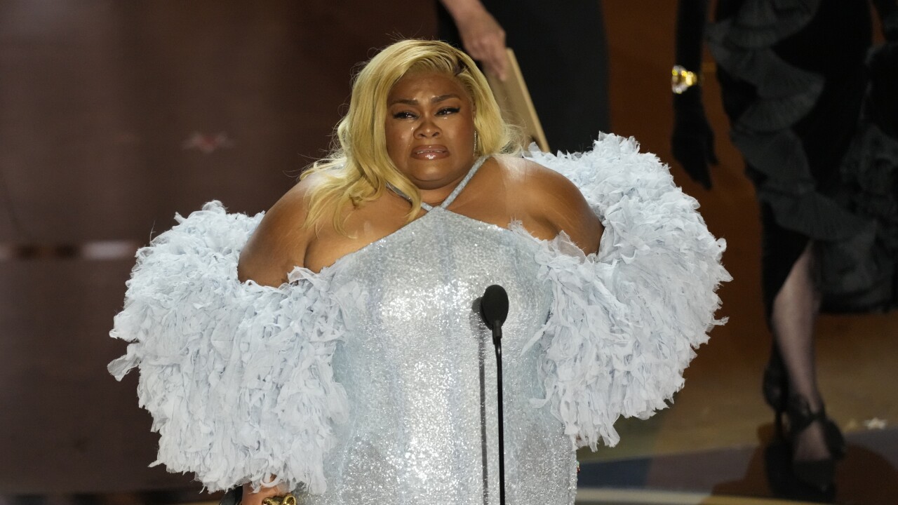 Da'Vine Joy Randolph accepts the award for best performance by an actress in a supporting role for "The Holdovers" during the Oscars on Sunday, March 10, 2024, at the Dolby Theatre in Los Angeles. 