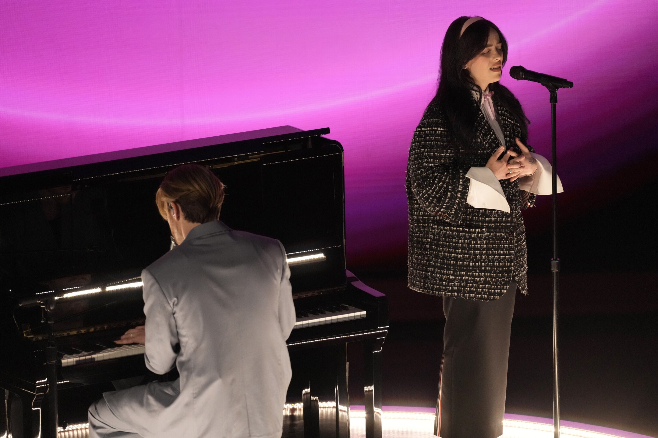 Finneas, left, and Billie Eilish perform "What Was I Made For?" from "Barbie" during the Oscars on Sunday, March 10, 2024, at the Dolby Theatre in Los Angeles. 